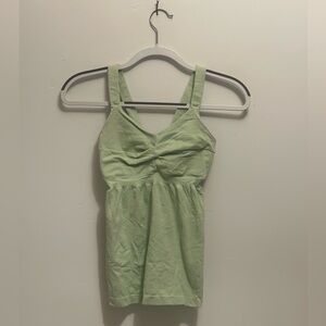 LIKE NEW Athleta light green workout top with twist back/front